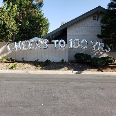 Cheers to 100 years! Megaloon arch.