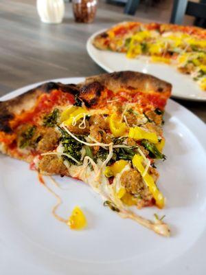 Sausage & Rapini Pizza with peppers and extra sauce