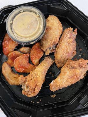 What's left of naked wings with garlic parm on the side & fries.