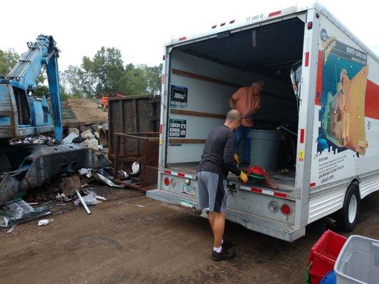 Unloading a truck of scrap