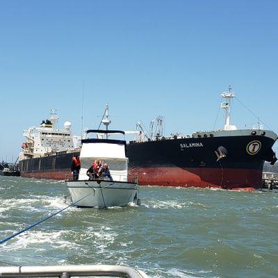 We towed this vessel, that was dragging anchor, safely away from a collision with the ship at the Chevron Long Wharf.