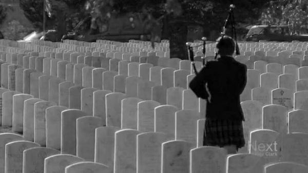 Colin bagpiping for a military service at Fort Logan National Cemetery.