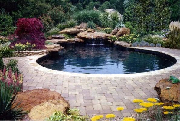 Custom Natural swimming Pool in Laurel Maryland. Waterfalls, Dive Rock, Boulders, Baja Step, stone work,