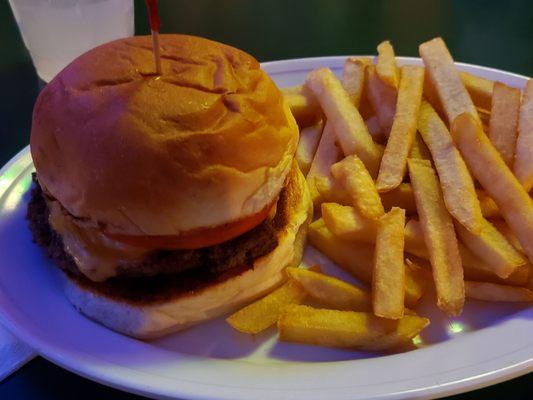 Cheeseburger with fries.  The burger was over cooked, but it was served on a delicious homemade bun.