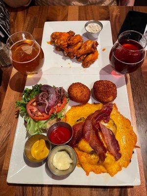 This is the Buffalo wings, the cheddar blanket burger and the brew on the right is called the Unknown. Make sure you get that one.