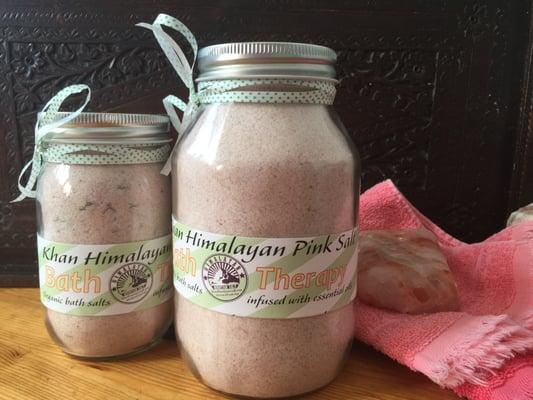 Khan Himalayan Pink Salt Bath Therapy Bath Salts with pink, red, and black salts infused with essential oils.