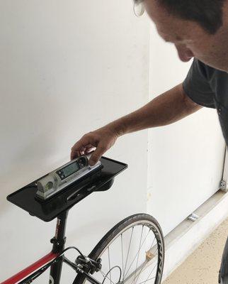 Mike leveling my bike seat before the height adjustment.