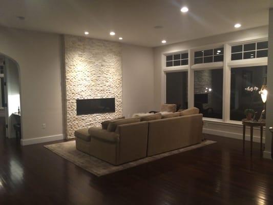 Was stumped designing around our 52" widescreen modern fireplace.  Linda figured it out - warm, textured, not too dark. Love!