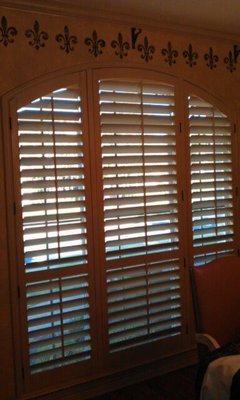 Arched Shutters in dining room