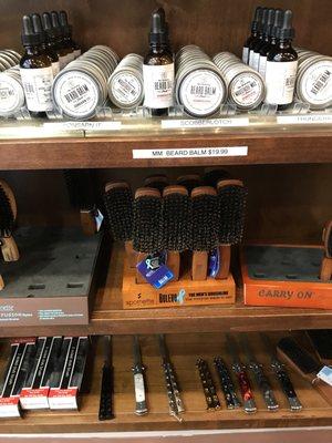 A great selection of MM-brand balms and oils, along with several available brushes and razors...