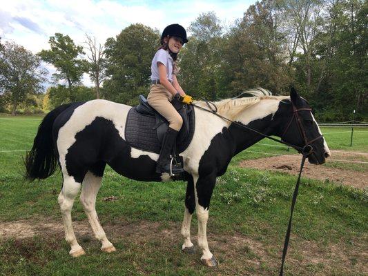 Independent rider on the lunge line during a therapeutic riding lesson.