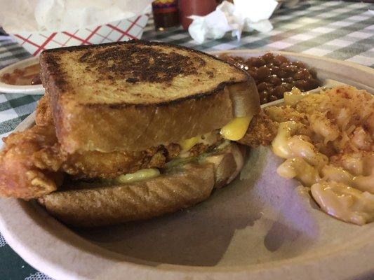 Gus's feature: served on buttered cheese toast, filled with jumbo chicken tenders, macaroni and cheese&buffalo ranch sauce.