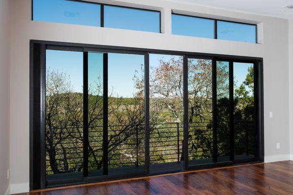 Quaker sliding patio door with transoms