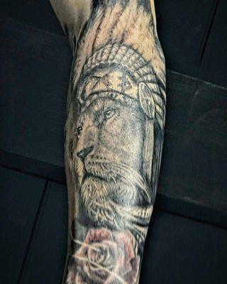 lion forearm tattoo