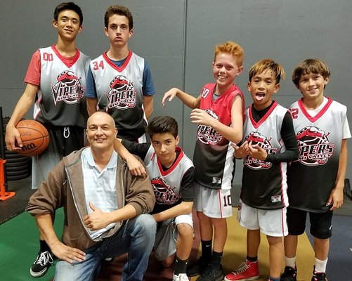 Some of the Vipers fashioning their new uniforms with Coach Ed Alvarez