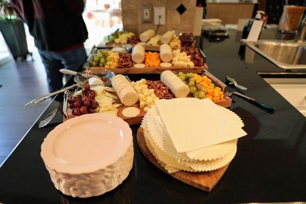 Cheese platters! We decided last minute that we were going to include cheese platters so she brought her beautiful platters to use!