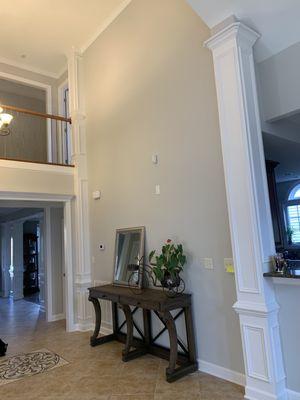 After- loft closed with solid wall. The new wall is Incorporated perfectly with the existing columns.