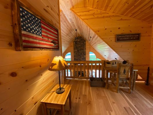 Loft with a beautiful desk!   See all the pics at www.eagleridgeloghome.com