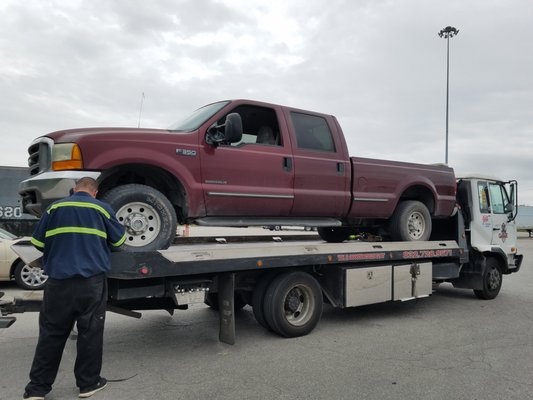 My 1999 F350 being towed to M and T on April 3, 2019. Clutch problem with fix for $103.