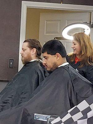 Husband (white guy) getting a birthday haircut and beard trim.