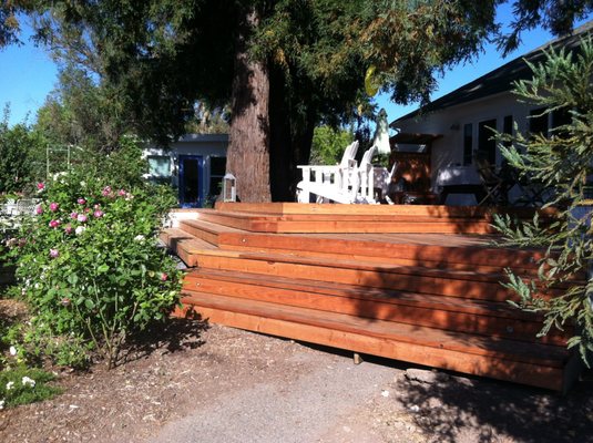 New deck with rap around stairs.