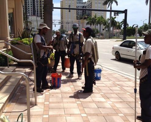 High Rise Window Cleaning Crew taking a break after a long drop in West Palm Beach Florida