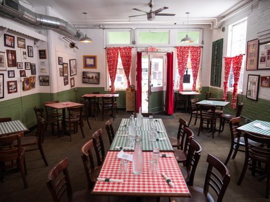 This cozy space effortlessly blends rustic elements with modern sophistication, promising an unforgettable dining experience.