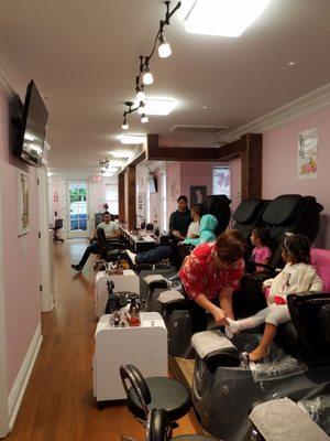 This is a shot of the salon inside from the rear of the shop looking toward the front of shop