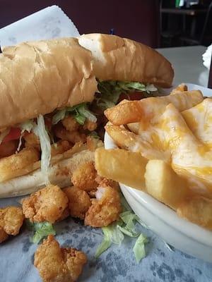 Shrimp po-boy and marsh fries!  Rich rown gravy at the bottom of melted cheese fries was an awesome surprise.