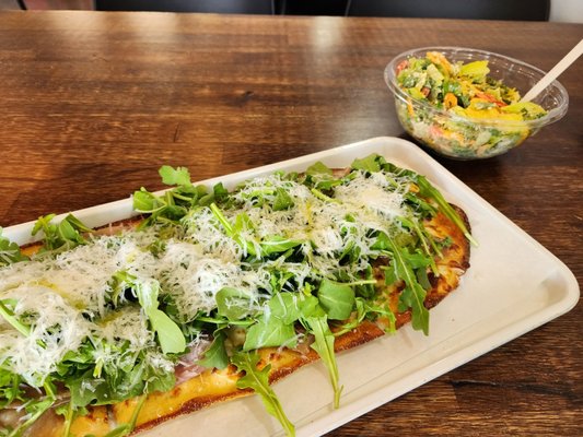 Cesar salad and lemon arugula pizza.