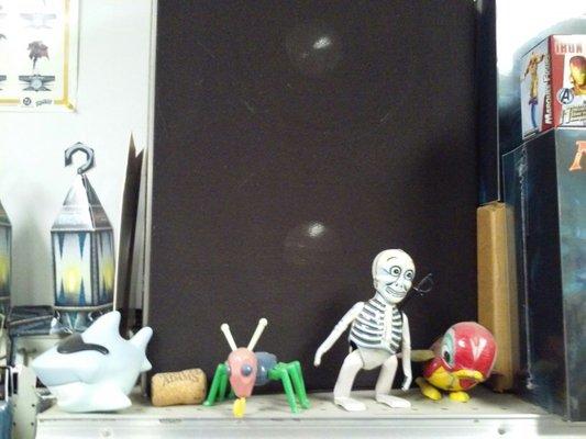 More toys, dancing tin skeleton, cootie bug, dancing tin bird