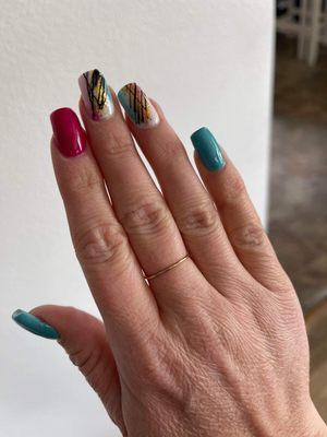 Dipping with free hand nail art.