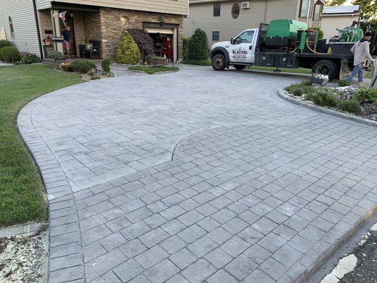 Before/After: Sandblasting and removing sealant and concrete paint from driveway