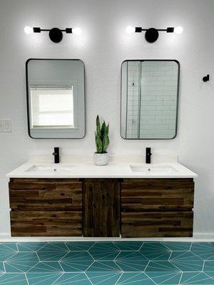 Bathroom double vanity, mirrors, and lights