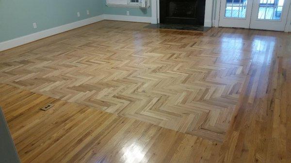 Irmo project: finished pics of the new prefinished oak hardwood floors installed in a herringbone design.