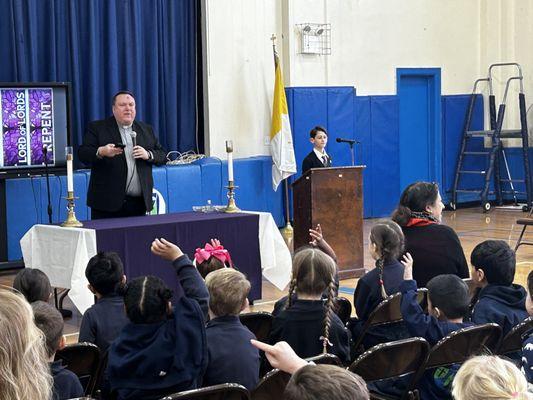 Fr. Abels preparing our students for Ash Wednesday