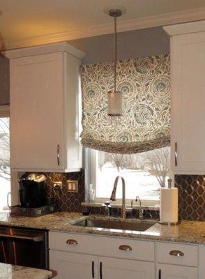 Roman shades can be customized by fabric, style & trim.