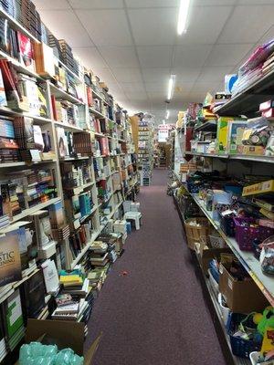 Aisles of books and kid toys.