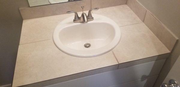 Ceramic tile countertop on bathroom vanity