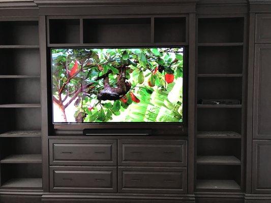 TV installed inside of a CWC custom made cabinet