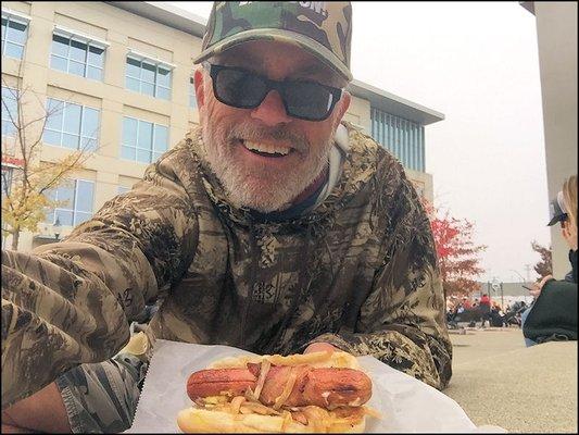 I'm ready to enjoy my bacon-wrapped hot dog on Vernon Street, in downtown Roseville, prior to the "2021 Holiday Parade."