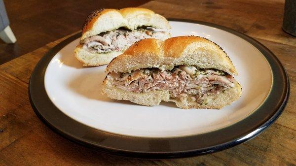 Porchetta with mayo and salsa verde. $10 plus tax and worth every penny.