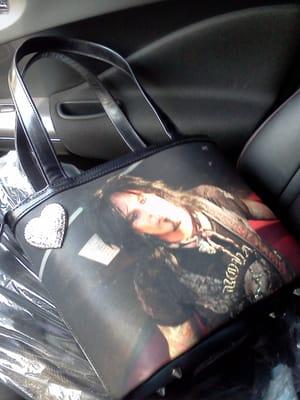 This is a Custom Nikki Sixx leather bucket bag!