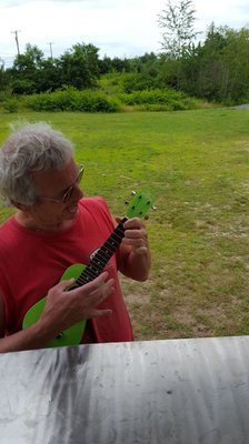 Our Customer who wrote a song for Bumpa's Lunch!! Note the green mandolin...