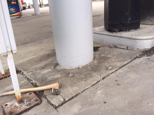 Debris, neglect outside Circle A at gas pumps. Located within sight of their corporate offices. Don't they care what their place looks like?