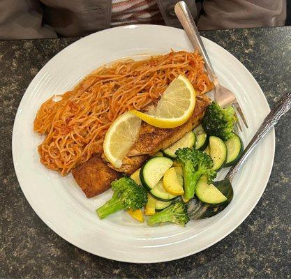 Grilled salmon over angel hair pasta with fresh vegetables