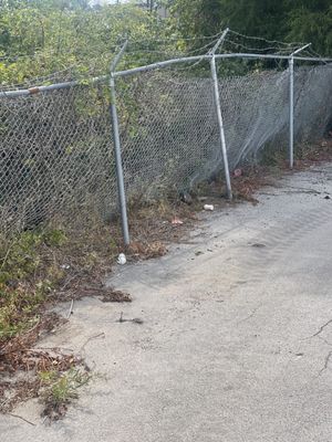 Damaged fence from snow plow contractor