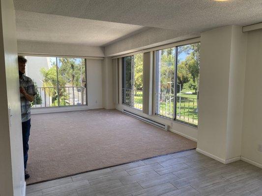 Dining area and living room in 2 bedroom unit