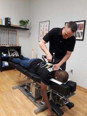 Chiropractic Adjustment performed with an Arthrostim Adjusting Instrument.