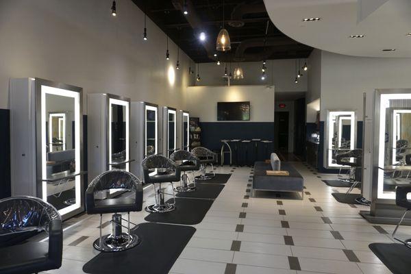 The chic salon interior and hair styling stations at W. Daly Aveda salon spa's luxurious Newnan Salon and Spa location.